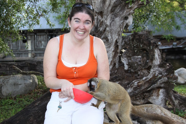 Professional blogger Ashley Grant feeding a lemur