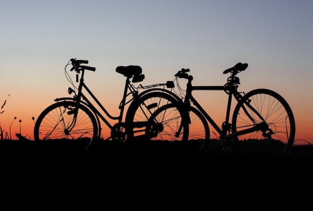 bikes against a sunset at dusk