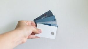 Hand holding multiple credit cards