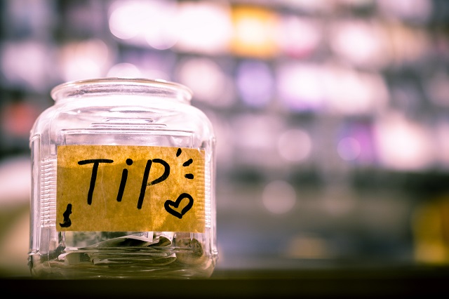 Tip Jar Sitting On A Counter