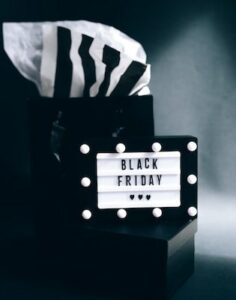 Black Friday sign with gift bag