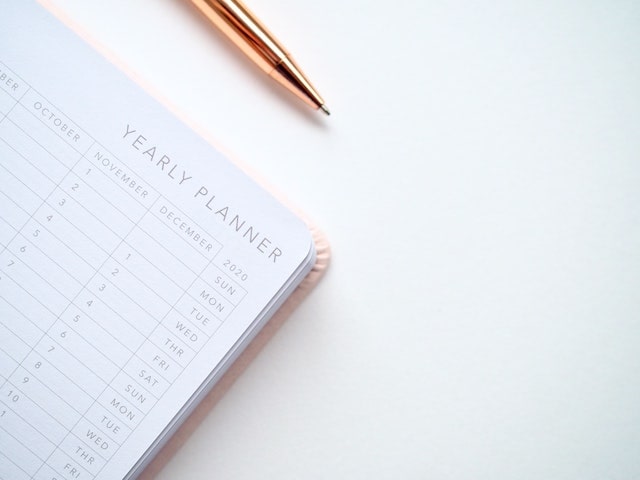 Yearly planner with gold pen