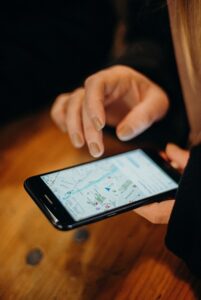 Person checking map on smartphone