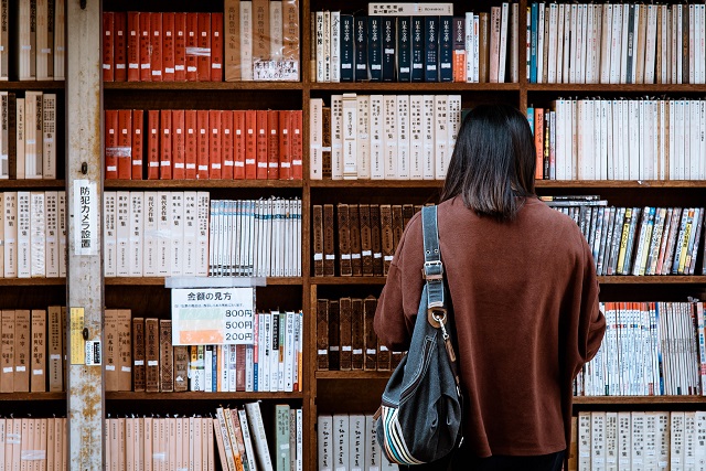 Person browsing books