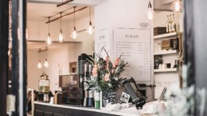 Industrial style coffee shop with menu displayed