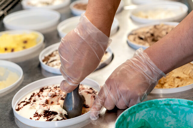 person scooping ice cream