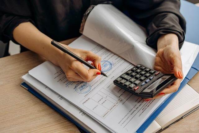 Woman reviewing paperwork