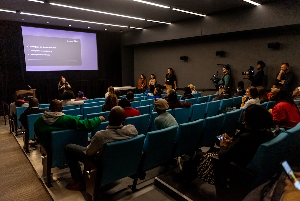 A presentation taking place in an auditorium