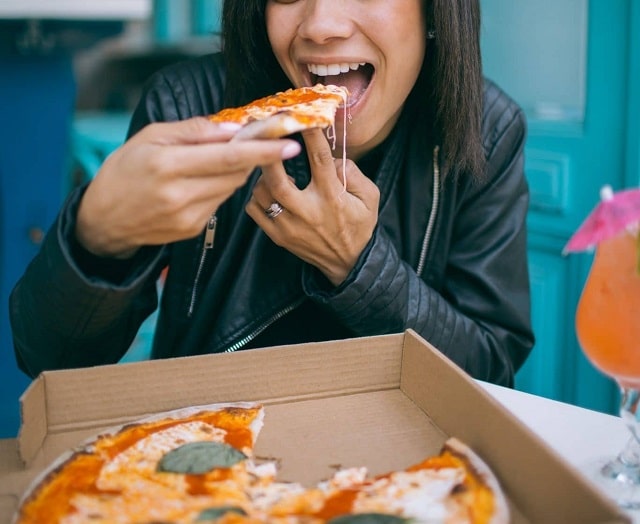 Domain Extensions Woman Eating Pizza