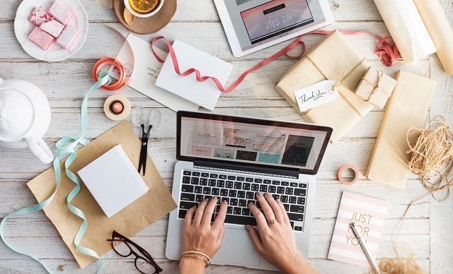 Woman On Social Media Surrounded By Gifts