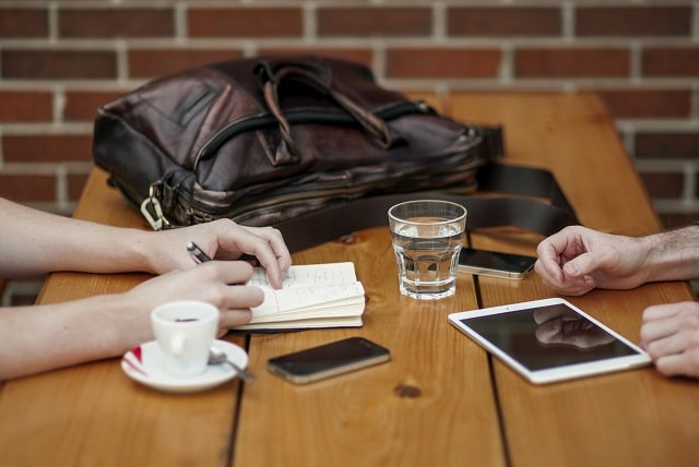 Group Working Session At Coffee Shop