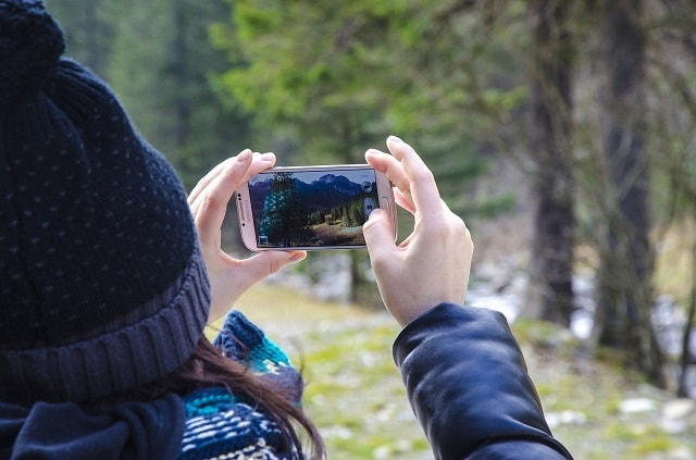 Woman Filming During Winter