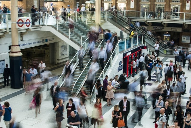 Customers in a Busy Train Station