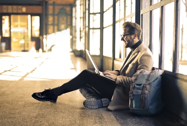 How To Sell Stuff On Amazon Happy Man On Laptop