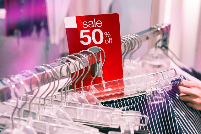 Clothing Rack With Sale Sign