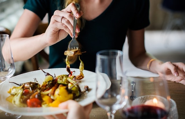 SEO For Restaurants Woman Sampling Dish