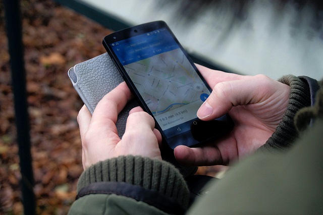 User Checking Map On Smartphone