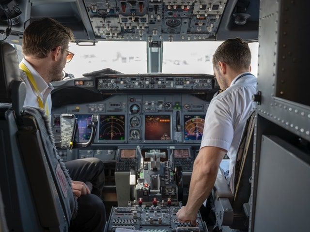 Website Launch Checklist Male Pilots In Cockpit