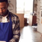 Man running his microbusiness with the support of stimulus checks