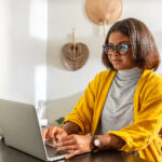 Black Woman Business Owner at her computer