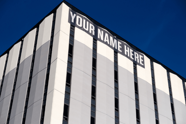 Large Office Building With &quot;Your Name Here&quot; Sign