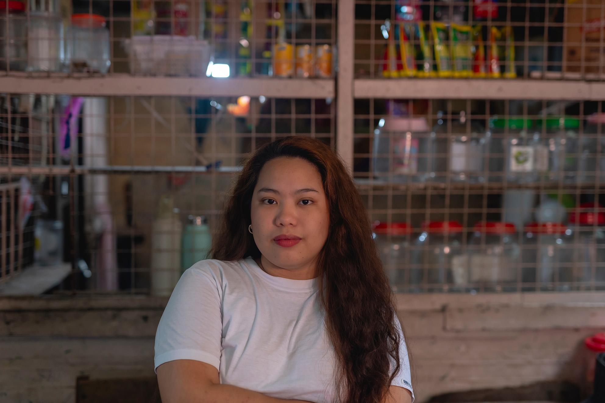 a female sari sari store owner