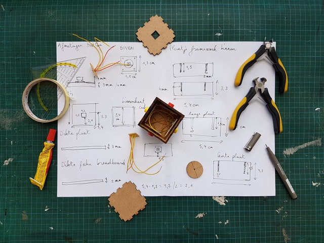 Diagram and Tools on a Work Surface