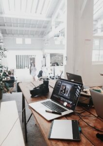 Laptop and Camera on Desk