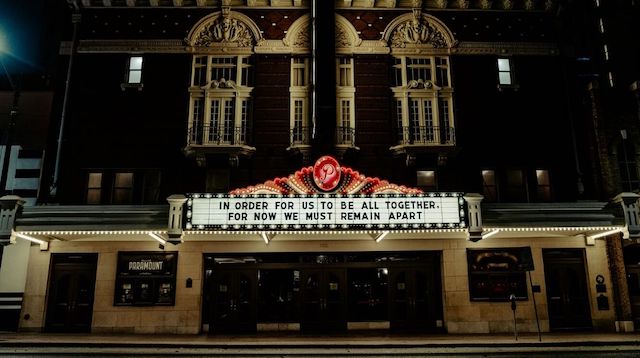 Global Economic Crisis Theatre Marquee with Covid Message