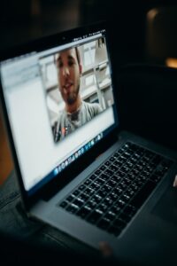 Laptop Showing a Man on a Video Conference