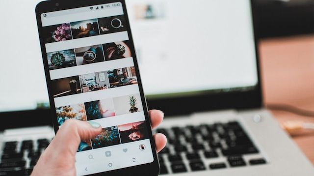 Social Media Influencer Woman Holding Smartphone