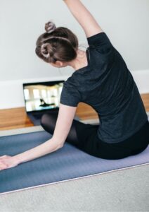 Stay Healthy Woman Taking Online Yoga Class