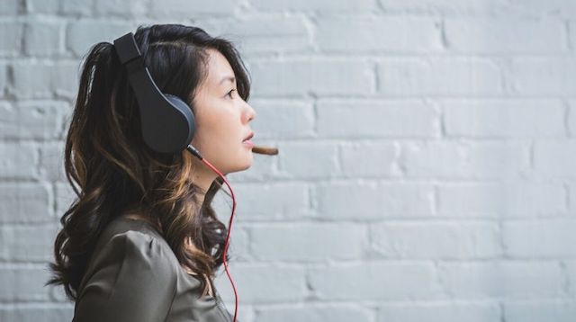 Young Woman Wearing a Headset