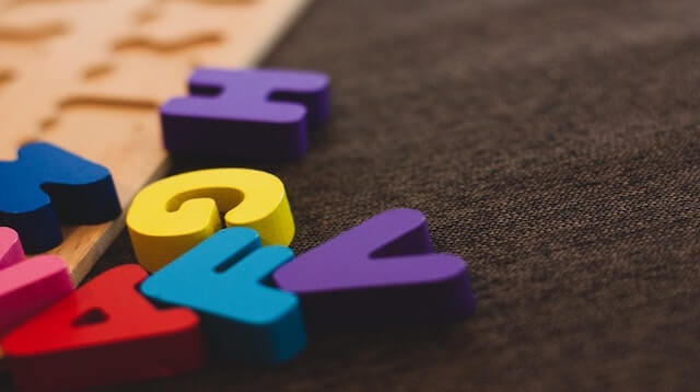 Brightly coloured wooden letters