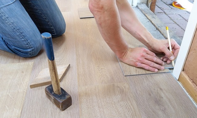 Carpentry Apprenticeship Carpenter Laying a Floor