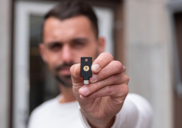 Man holding Yubikey