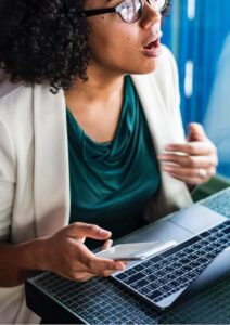 Market Research Woman with Laptop and Phone