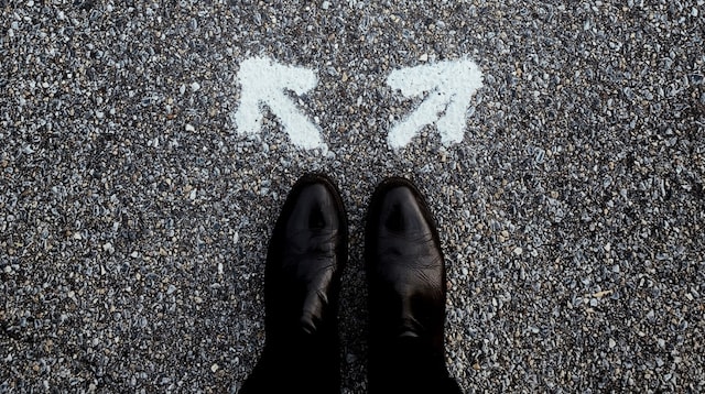 Marketing Funnel Man Standing Near Arrows