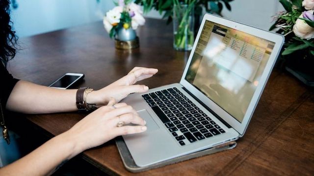 Person Working on Laptop