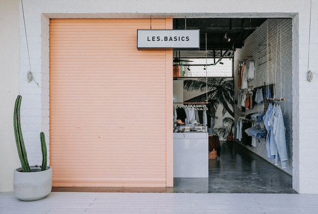 Small storefront with an orange door