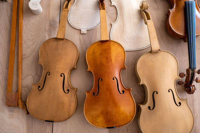 Violins in various stages of assembly