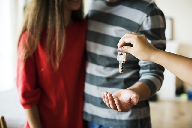 Build a Website Agent Handing Keys to Couple