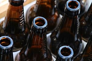 Clean brown bottles in a crate