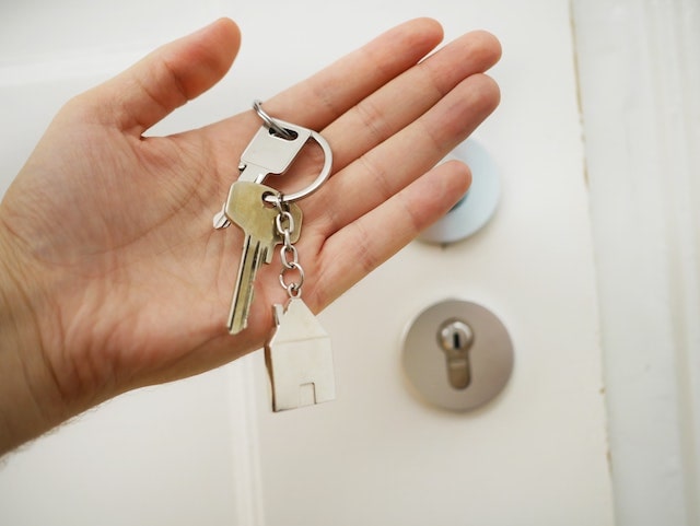 Close-up of a hand holding house keys