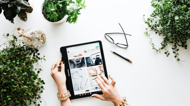 Woman looking at products on her tablet