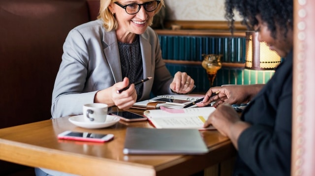 Growth Mindset Two Professional Women Meeting