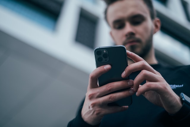 Man looking at his smartphone