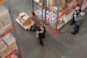 Overhead view of people working in a warehouse