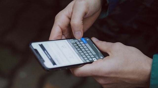 SEO Canada Man on Mobile Phone