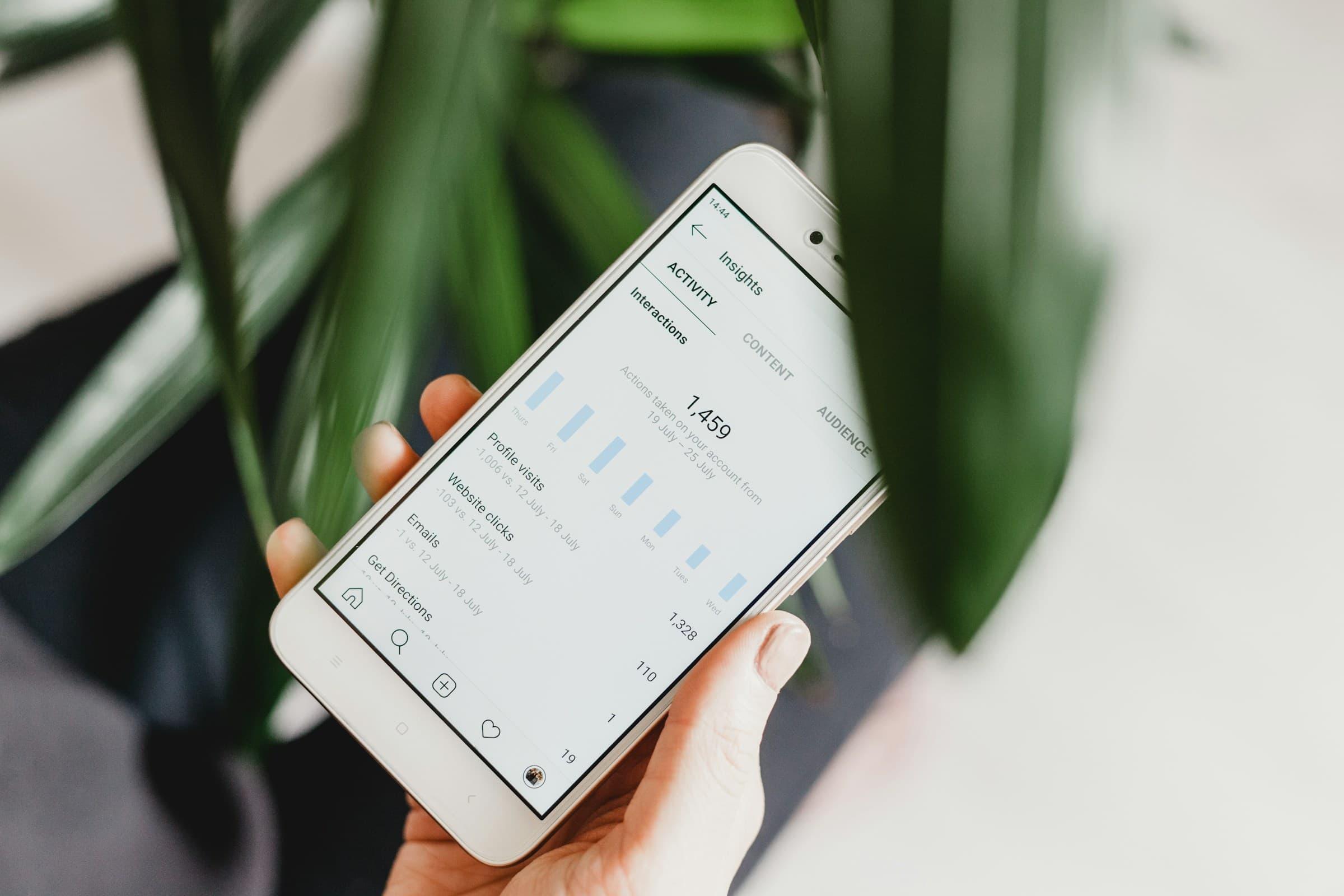 Phone showing metrics for Instagram